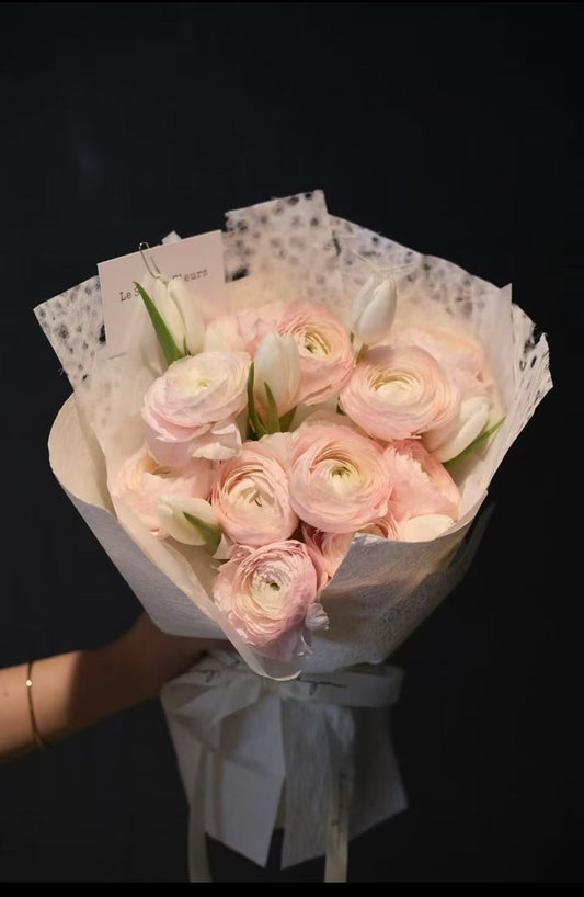 Pink Ranunculus Asiaticus With Tulips